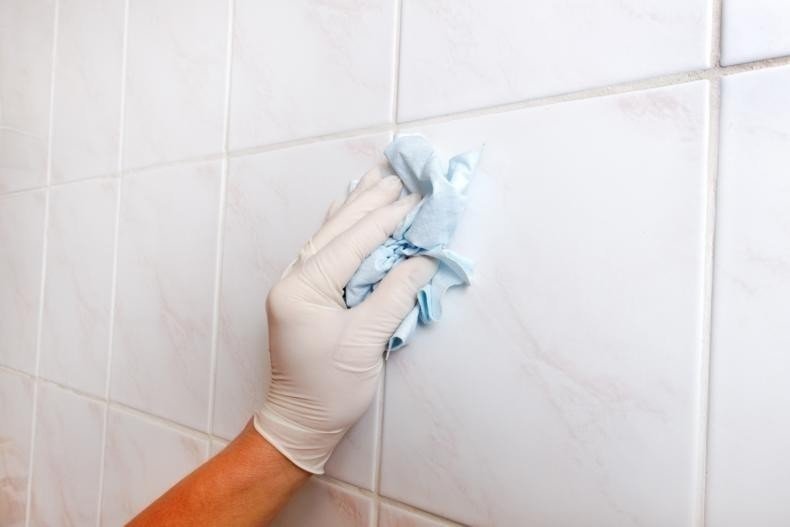 Cleaning urine stains from tile grout