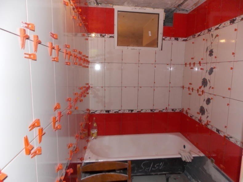 Укладка плитки в ванной на стены и пол